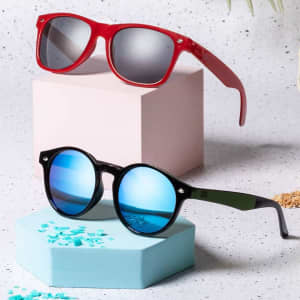 Two pairs of sunglasses: one red with grey lenses and one black with blue mirrored lenses, displayed on pastel pedestals.