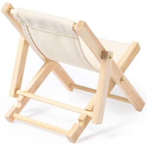 A wooden phone stand in natural colour with a cream fabric seat, featuring a foldable design.