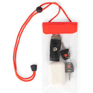 A clear bag with a red top contains a bar of soap and car keys, featuring a drawstring for closure.