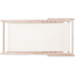 A beige canvas chair with a wooden frame, featuring a straight design and minimalistic style, has a logo on the side.