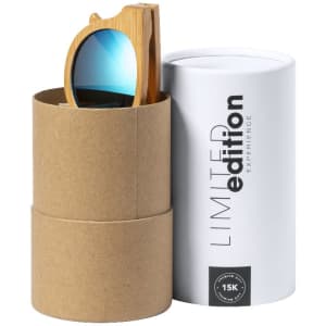 A pair of bamboo sunglasses with mirrored lenses inside a cylindrical packaging. The packaging has a logo.