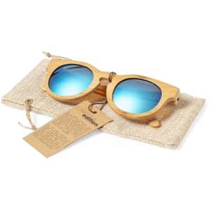 Bamboo sunglasses with blue lenses, presented on a textured pouch with a tag. Features a logo on the sunglasses.