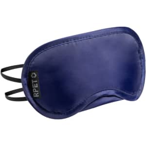 A navy blue eye mask with black straps and a branding label on the side.