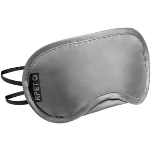 A grey travel eye mask with two elastic straps and a logo on the side.