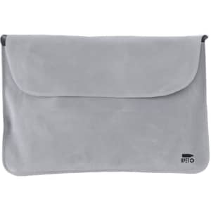 A grey Vildex Pillow with a fold-over flap and a small logo in the bottom corner.