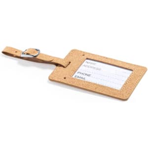 A tan luggage tag with a clear window for identification details and a metal buckle for attachment.