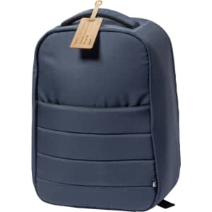 A grey padded luggage tag is attached to a navy blue backpack featuring a front compartment and a top handle.