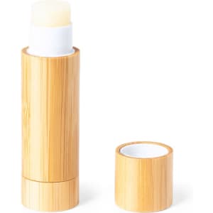 A bamboo tube of Fitol Lip Balm with a white applicator top and a removable cap.