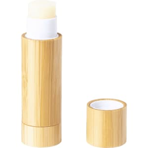 A bamboo-styled lip balm container with a removable cap, featuring a pale, creamy lip balm stick.