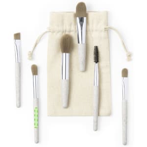 A set of five eyeshadow applicators with beige handles, featuring a drawstring pouch for storage.