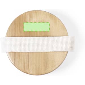 A round wooden exfoliating massage brush with a white strap across the centre and a logo on the top surface.