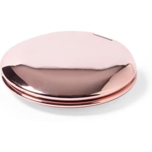 A rose gold pocket mirror with a sleek, shiny surface and a compact oval shape. It features a logo on the back.