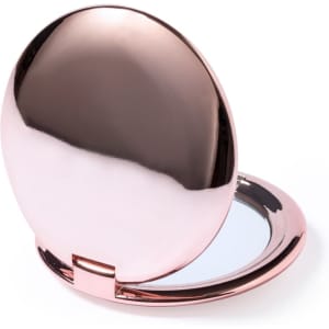A rose gold pocket mirror with a sleek, rounded design, opened to reveal a reflective surface inside.
