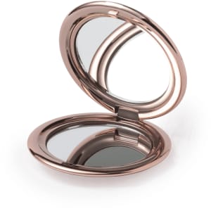 A rose gold pocket mirror with a hinge, featuring two reflective surfaces inside.