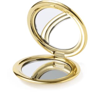 A gold pocket mirror with a sleek, round design, featuring two reflective surfaces inside.