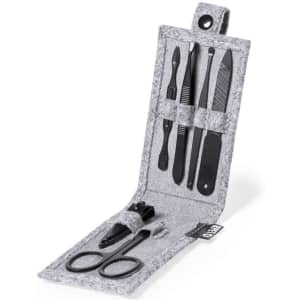 A grey manicure set featuring scissors, clippers, tweezers, and files in a compact case with a logo.