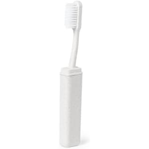 A white toothbrush with a matching protective case, featuring a simple design. The product includes branding.