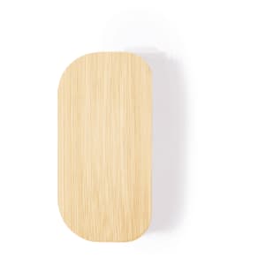 A wooden pillbox with a smooth, natural finish and an oval shape. It features a subtle logo on the surface.