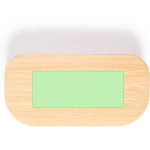 A bamboo pillbox with a green label on the top. The box has an oval shape and a natural finish.