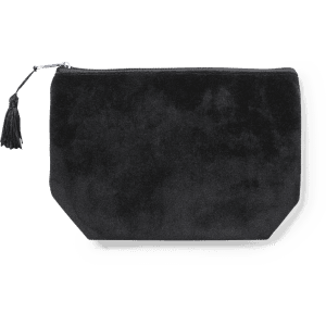 A black suede toiletry bag with a zip closure and a tassel detail. It has a stylish, textured finish.