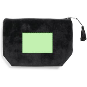 A black toiletry bag with a textured finish and a tassel zip pull, featuring a blank green patch.
