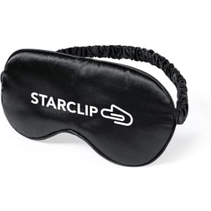 A black eye mask with an elastic band and a logo on the front. Ideal for rest or relaxation.
