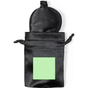 A black satin eye mask with a green square on the front, packaged in a matching black pouch.