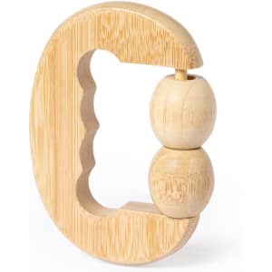 A bamboo massager featuring a circular design with two rolling balls. It has a natural wood finish.