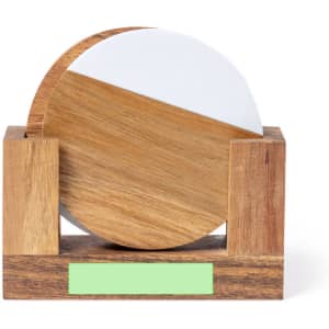 A wooden coaster set featuring a round coaster with a white and natural wood design, displayed in a wooden holder.