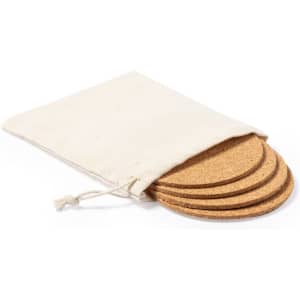 A set of four cork coasters in a natural fabric pouch. The coasters have a round shape and a rustic finish.