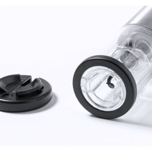 A transparent electric corkscrew with a black base and lid, designed for opening wine bottles.