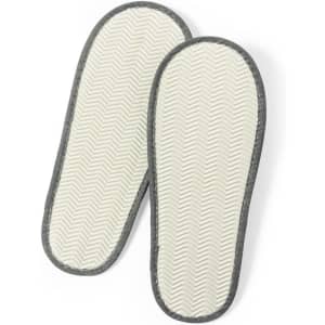A pair of Kaicel Slippers in grey and white with a herringbone pattern. The image features a logo on the slippers.