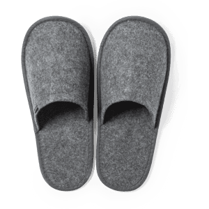 A pair of grey slippers made from soft material, featuring an open toe design and a simple logo.