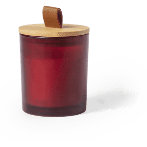 A red aromatic candle in a glass container with a bamboo lid and leather strap.