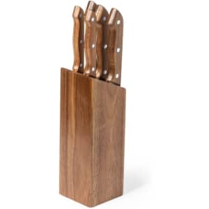 A wooden knife block in a light brown finish holding four stainless steel knives with wooden handles.