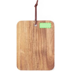A wooden cutting board with a natural finish and a leather hanging loop. It features a blank area for labelling.