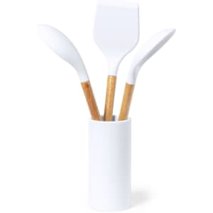 A white kitchen utensil set featuring three silicone spatulas with bamboo handles, displayed in a white holder.