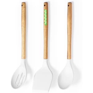 A set of three kitchen utensils with wooden handles and white silicone heads, featuring a logo on one handle.