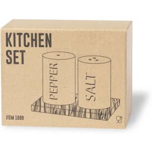 A salt and pepper shaker set in a wooden holder, presented in a simple cardboard packaging.