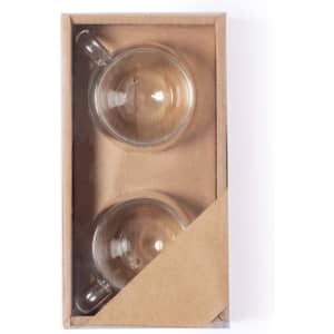 A set of two clear glass mugs in a cardboard box, featuring a minimalist design.