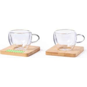 A set of double-walled glass mugs with transparent design, resting on wooden coasters.
