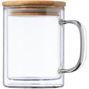 A glass insulated mug with a transparent body, a stainless steel handle, and a bamboo lid.