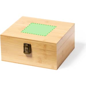A square bamboo box with a metal clasp, featuring a green outlined area on the top.