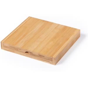 A bamboo cheese board with a smooth, rectangular surface and a subtle groove along the edge.