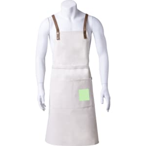 A light-coloured apron with brown straps, featuring a pocket on the front and displayed on a mannequin.