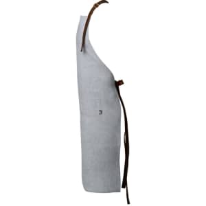 A grey apron with a brown leather tie, featuring a pocket and a subtle logo.