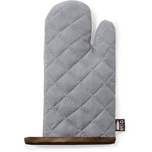 A grey quilted kitchen mitten with a brown trim, featuring a small logo on the side.