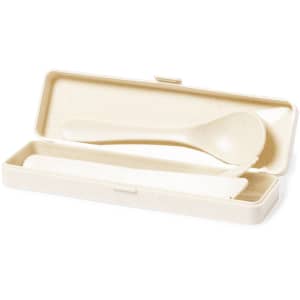 A cutlery set in an off-white case, featuring a spoon and a knife. The case has a logo on it.