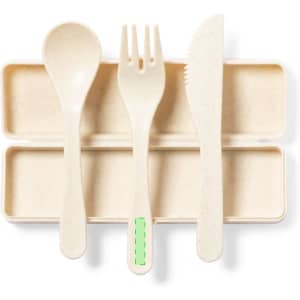 A cutlery set featuring a spoon, fork, and knife in a natural colour, stored in a matching case with a logo.