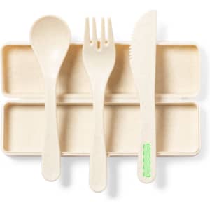 A cutlery set featuring a spoon, fork, and knife in natural beige colour, set in a two-slot holder.